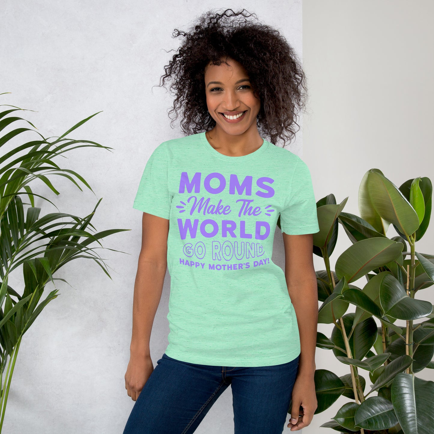 Worldly Love: Unisex Mother's Day T-Shirt - 'Moms Make the World Go Round' on Purple Letters